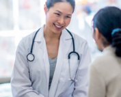 Primary care doctor consulting with patient